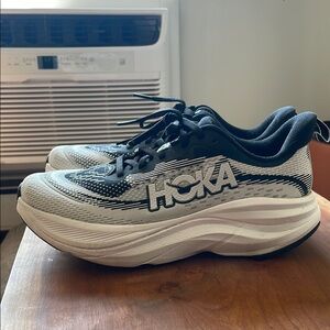 Hoka Black and White Skyflow Sneakers